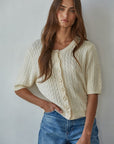 Cream Pearl Button Cardigan Top