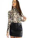 Whisper White Animal Print Turtneck Top